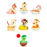 A group of small figurines in a bowl with a red ball in the middle from the tokidoki Delicious Unicorno Series 2 - Blind Box.