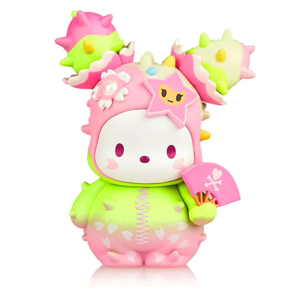 A colorful Hello Kitty figurine from the tokidoki x Hello Kitty - Series 3 Blind Box, decorated with Spring flowers and a dinosaur costume.