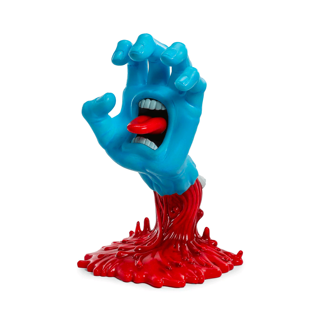 The Kidrobot (US) Screaming Hand 40th Anniv. Glow Art Figure features a blue cartoon hand with mouth and tongue, rising from a red, splattered base, and glows in the dark—an eye-catching collectible.
