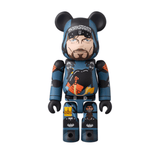 The Medicom (JP) Be@rbrick Series 50 Blind Box features a bearded man with blue and black clothing, orange and yellow highlights, and black bear ears—ideal for Bearbrick collectors or blind box fans.