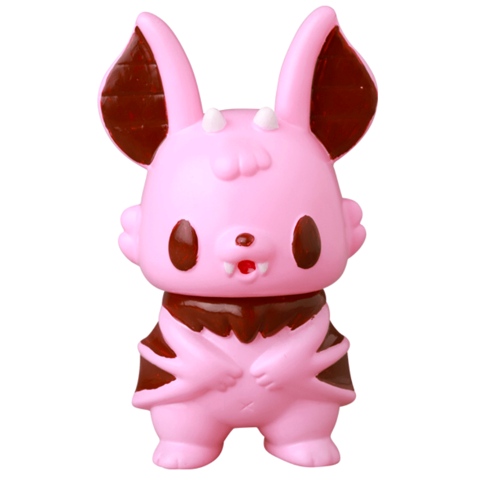 The VAG 10th Anniversary — Kopatapatan by Medicom (JP) is a pink and brown cartoon bat vinyl toy with large ears, small fangs, and tiny horns—adorable and reminiscent of collectible Japanese gachapon figures.