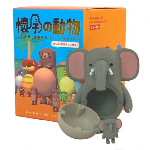 A toy elephant figurine in front of its packaging box, part of the "Ryan Animal - Series 3 Blind Box" blind box, makes a perfect baby shower gift by A Good Company (HK).