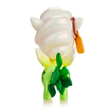 A collectible toy figurine of a green dinosaur with a white shell and an orange sword, styled minimalist, isolated on a white background. Inspired by the Tokidoki Veggie Unicorno - Daikon Special Edtion Figure.
