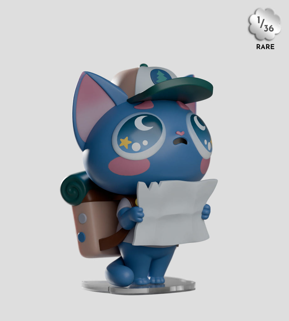 A blue cartoon cat figurine with a cap and backpack holds a map. This unique “1/36 RARE” figure is from the Widdle Baby Blind Box series by Kaleidos Creative, making it a special collectible.