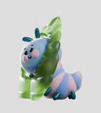 A pastel cartoon Wooly Bear with blue and pink stripes leans on a green leaf against a gray background—a cute, fuzzy collectible from the Kaleidos Creative Wooly Bear and Friends Vinyl Blind Box series. Perfect for any caterpillar collection!.