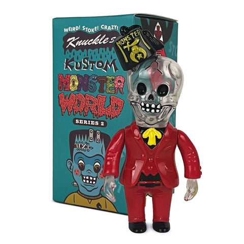 A toy figure resembling a skeleton in a red suit with black bowtie sits in front of the colorful "Knuckle’s Kustom Monster World — Series 2 Blind Box" by How2Work (HK).