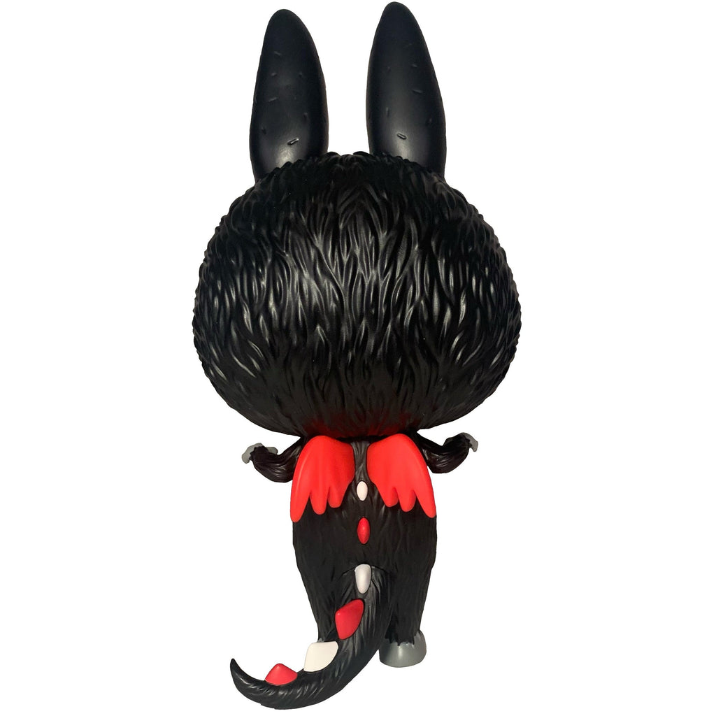 Zimomo- Devil by How2Work (HK) is a mischievous vinyl collectible featuring a black creature with large ears, red wings, and a spotted tail—shown from the back. A must-have addition for any Zimono fan’s collection.