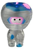 VAG 41 — Yummy Mummy by Medicom (JP) is a small, transparent plastic figure with a blue and pink headband, large round eyes, and a stylized humanoid shape inspired by Japanese vinyl toy designs.