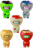 Five vibrant cartoon-style VAG 41 — Yummy Mummy figures by Medicom (JP), each wrapped like a mummy with expressive eyes, are clustered together on a white background.