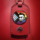 A Rotofugi Abe Progress Pride Hard Enamel Pin, a symbol of support for equal rights.