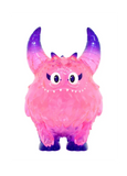 The Little Hut (HK) Rangeas Rex Jr. — Clear Pink is a collectible toy monster with large horns, big eyes, small fangs, and a bumpy clear pink texture, shown standing against a white background.