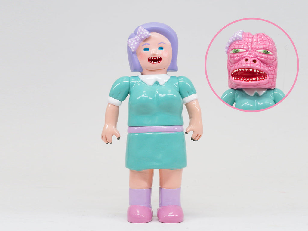 Paradise Toy About Animals Michiko/Dinosaur — Series 3: Doll in green dress with purple hair and bow, featuring a removable mask that reveals a pink, monster-like face, plus a cute dinosaur plush friend for imaginative play.