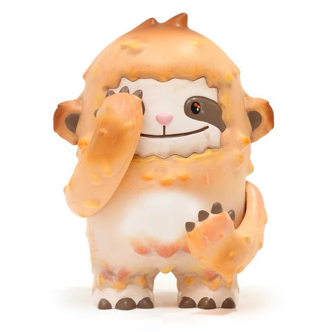 A small, cartoonish creature with a round body and a cheerful expression. It has fluffy, orange fur and appears to be waving with one of its front limbs is Dustin — OG from The Little Hut (HK).
