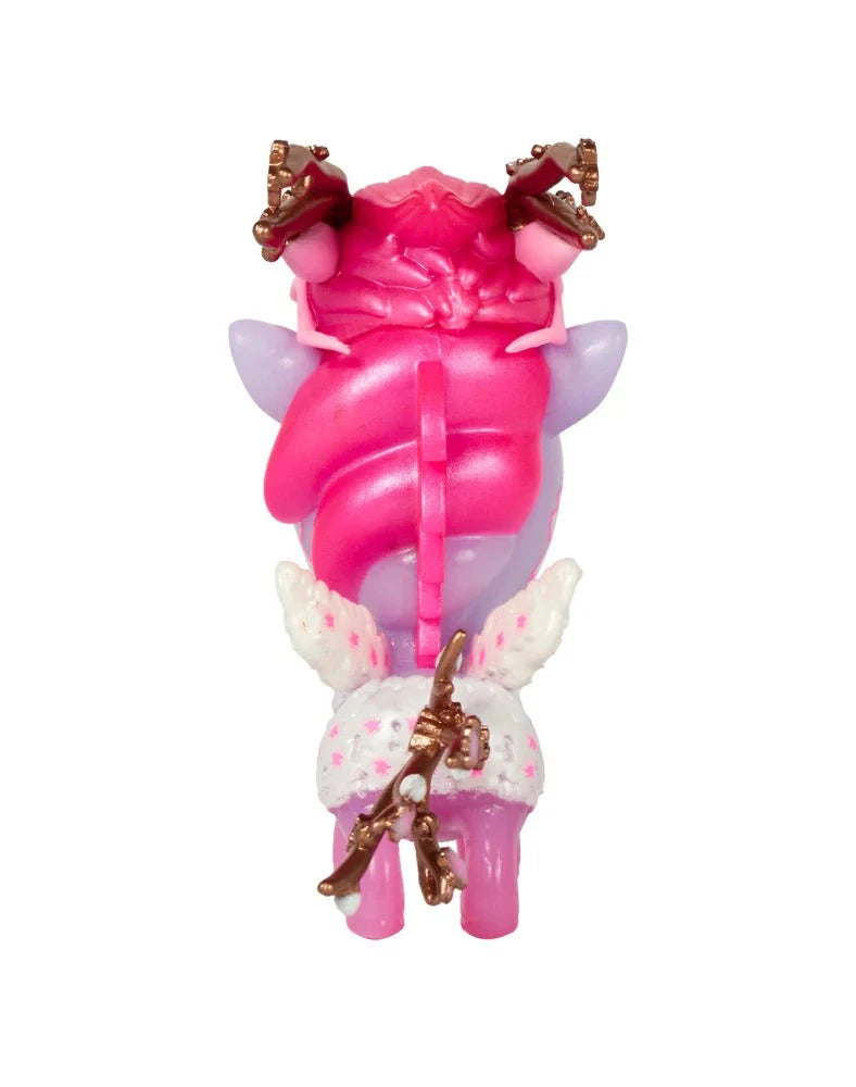 A small, pink and purple Tokidoki Cherry Dragon Unicorno toy with braided hair, white wings, and brown antler-like cherry blossom decorations, shown from the back.