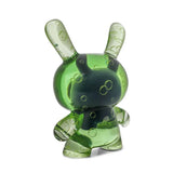 The Kidrobot Infected Specimen Dunny 8” GID Art Figure (LE 600) is a translucent green bunny-eared collectible with bubble-like patterns, standing upright on a white background.