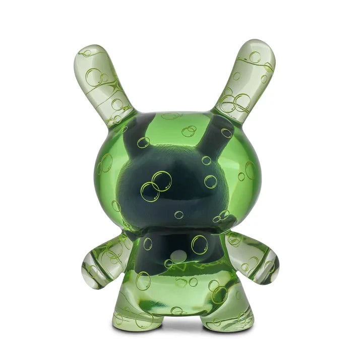 The Kidrobot (US) Infected Specimen Dunny 8” GID Art Figure (LE 600) features a green, translucent body with bunny-like ears and bubble patterns, displayed on a white background.