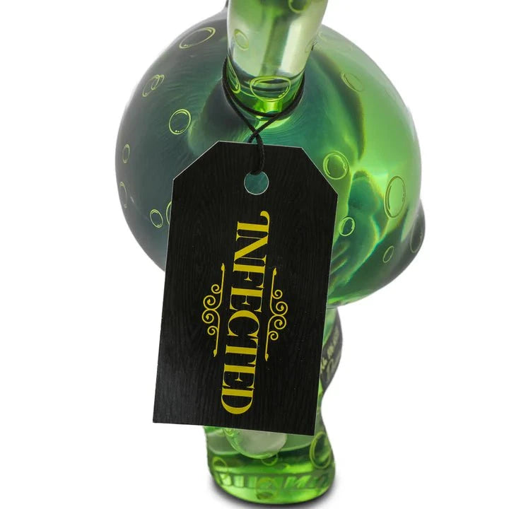 The Kidrobot Infected Specimen Dunny 8” GID Art Figure (LE 600) is a green glass mushroom-shaped art toy with bubbles and a stem featuring a black