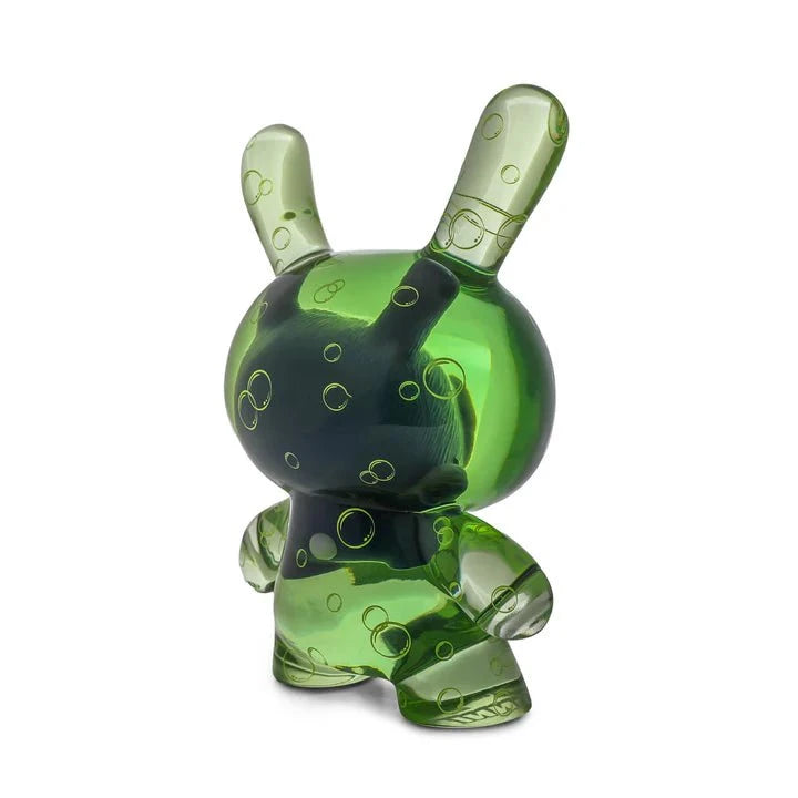 The Kidrobot Infected Specimen Dunny 8” GID Art Figure (LE 600) features a green transparent vinyl design with bubble patterns and bunny-like ears. Limited to 600 pieces, this collectible art toy is by Kidrobot (US).
