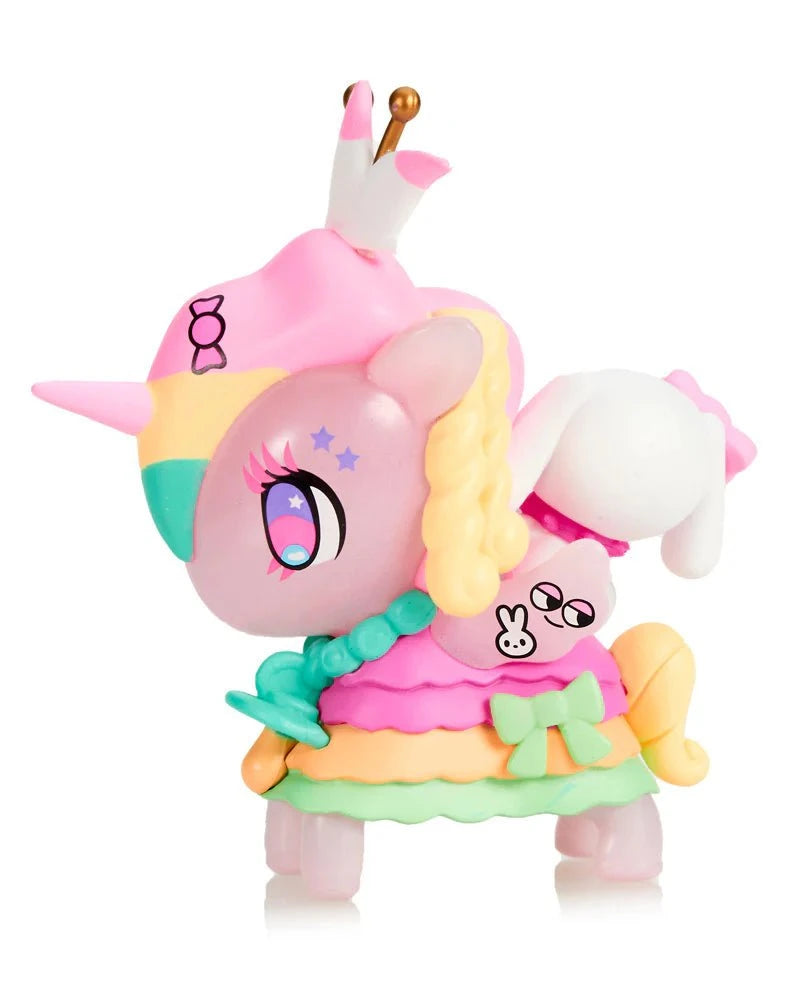 The Tokidoki Harajuku Princess Unicorno - Tanoshii Special Edition features pastel hues, star-shaped eyes, a crown, braided mane, and side bunny detail—an adorable collectible for Tokidoki fans and kawaii lovers alike.