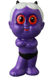 VAG 42 — HAPY by Medicom is a playful Japanese vinyl toy: a purple cartoon figurine with large red eyes, white hair, small black horns, and black shorts stands arms crossed, smiling—design inspired by gachapon figures.