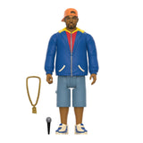 Toy Ghostface Killah ReAction - Ironman Figure from Wu-Tang Clan, wearing a colorful jacket, shorts, and cap, accessorized with a necklace and holding a microphone. Created by Super 7 (US).