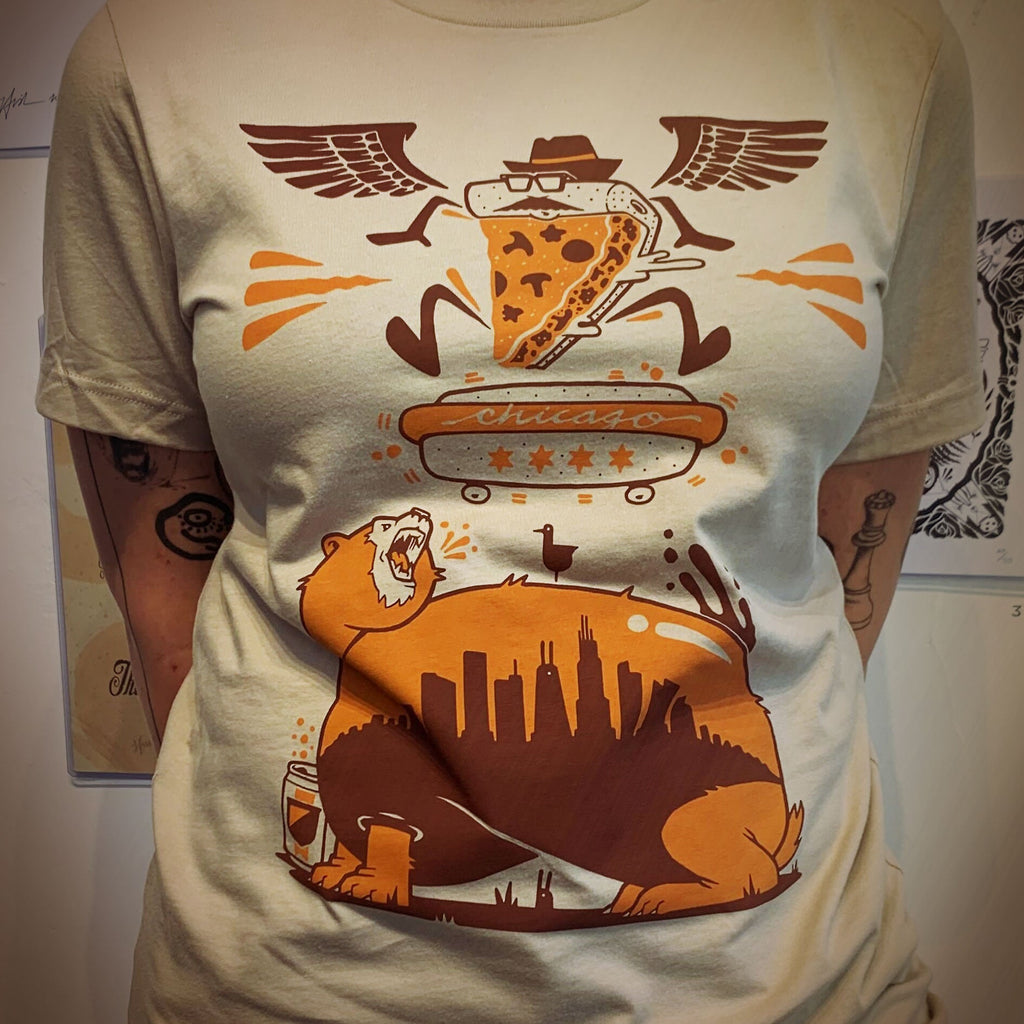 A woman wearing an Abe Froman Sausage King Unisex Tee by Jeremy Fish from Rotofugi (US).
