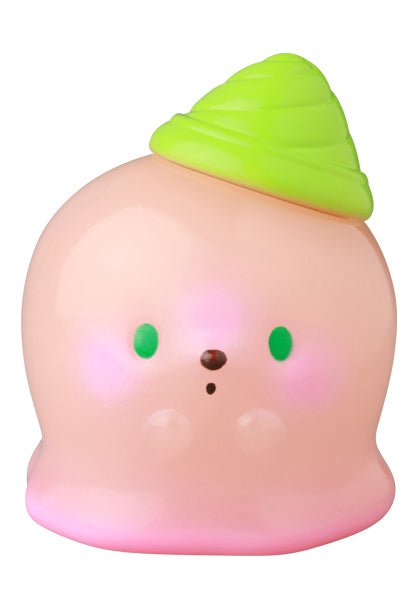 VAG 39 — Kaiju Icey Baby by Medicom (JP): A pink, rounded gachapon figure with green eyes, a small brown nose, blushing cheeks, and a green swirl hat—ideal for Japanese vinyl toy collectors.