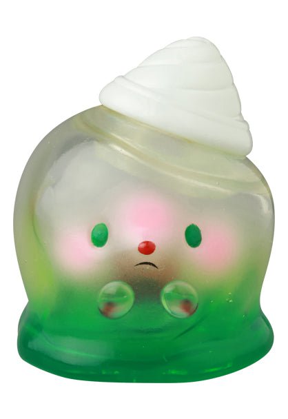VAG 39 — Kaiju Icey Baby by Medicom (JP) is a translucent green and clear Japanese vinyl toy with a white swirl on top, pink cheeks, green eyes, and a small red nose, inspired by jelly-like Vinyl Artist Gacha figures.