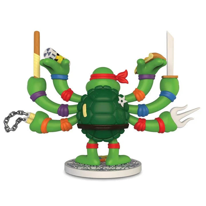 The Teenage Mutant Ninja Turtles TMNT GURU Resin Figure by CHOGRIN from Kidrobot (US) features a green turtle in a red mask, shown from the back with six arms holding ninja weapons, standing on a round base—a standout TMNT collectible.