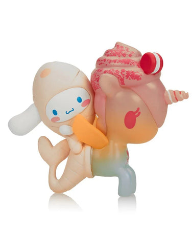 The tokidoki x Cinnamoroll Sweet Treats - Cinnamoroll x Mango'licious (Special Edition) features a cute figure of Cinnamoroll riding a pastel unicorn, perfect for sweet treat fans. Brand: tokidoki (IT).