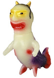 The Namanari Ningyo — VAG 10th Anniversary by Medicom (JP) is a vinyl toy figure with a fish-like body, small arms, red fins, and a humanoid face with yellow eyes, red lips, and golden horns—an homage to Japanese vinyl toy artistry.