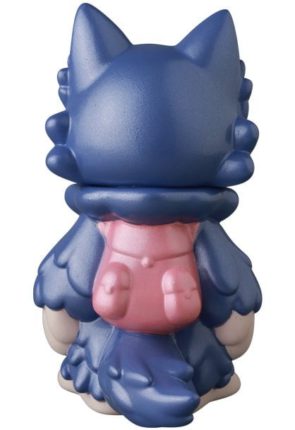 The Ookamikun — VAG 10th Anniversary vinyl toy by Medicom (JP), a blue wolf-like figure with a pink backpack, is shown from behind.