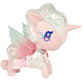 Add a touch of magic to your collection with the tokidoki Pixie Dust Fairy Unicorno Blind Box! This charming collectible features a small, pale pink and white Unicorno adorned with pink translucent wings, a white horn, a flower crown, decorative face markings, blue eyes, and pearl-like accents on its neck. It’s the perfect surprise for any collector or fan of tokidoki’s whimsical designs.