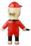 VAG 42 - Toromikun by Yoshimoto Kogyo, a Medicom (JP) collectible vinyl figure from the Vinyl Artist Gacha series, shown from the back in a red outfit and cap, with a pale face and side black mark.