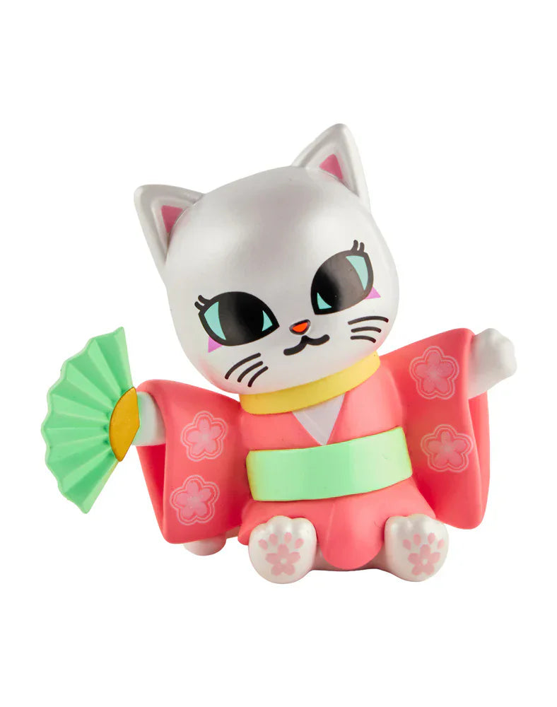 Celebrate cherry blossom season with Tokidoki’s Cherry Blossom Cats—Single Blind Box! Each figurine features a white cat in a pink, floral kimono holding a green fan, inspired by tokidoki’s signature cartoon style.