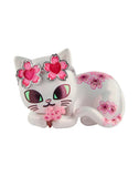 Celebrate cherry blossom season with Tokidoki’s Cherry Blossom Cats—Single Blind Box. Each white cat figurine features pink blossom designs, a flower crown, and holds pink flowers, capturing the magic of Tokidoki’s charming style.