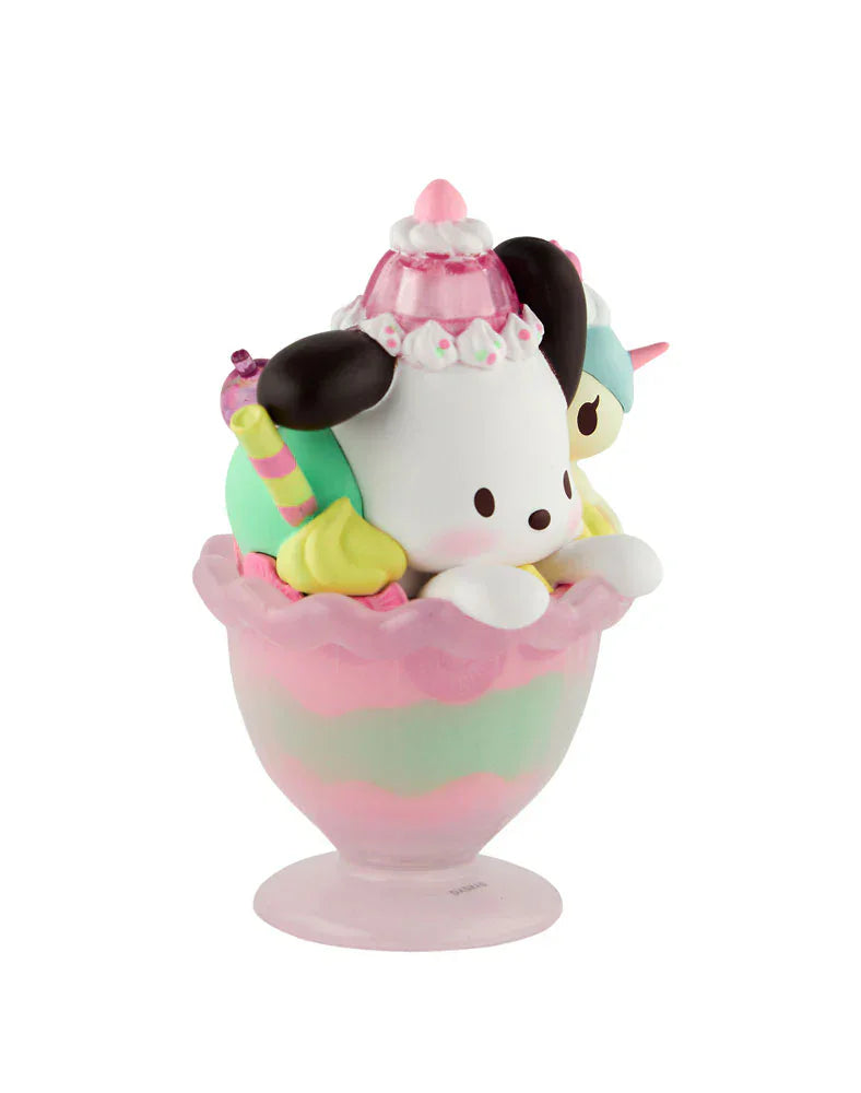 The tokidoki (IT) Tokidoki x Hello Kitty & Friends Fast Food - Pochacco Pink Unicorno Sundae (Special Edition) is a pastel dessert-shaped figurine featuring Pochacco and a bunny in a glass bowl with whipped cream and candy accents.
