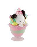 The tokidoki (IT) Tokidoki x Hello Kitty & Friends Fast Food - Pochacco Pink Unicorno Sundae (Special Edition) is a pastel dessert-shaped figurine featuring Pochacco and a bunny in a glass bowl with whipped cream and candy accents.