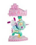 A pastel-toned bunny rides a unicorn under a pink-purple canopy on a heart base in the tokidoki x Hello Kitty and Friends Sweet Pink Carousel Blind Box—ideal for tokidoki fans or collectors of kawaii Sanrio figures.