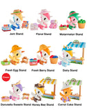 Nine tokidoki Farmers Market Unicorno Blind Box figures are displayed, each running a themed market stand—jam, floral, watermelon, egg, berry, dairy, sweets, honey bee, or carrot cake.
