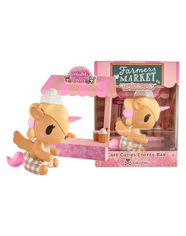 The tokidoki Farmers Market Unicorno - Cafe Cuties Coffee Bar (Special Edition) features a Unicorno serving coffee at a pink café stand, packaged in a box labeled with the tokidoki brand.
