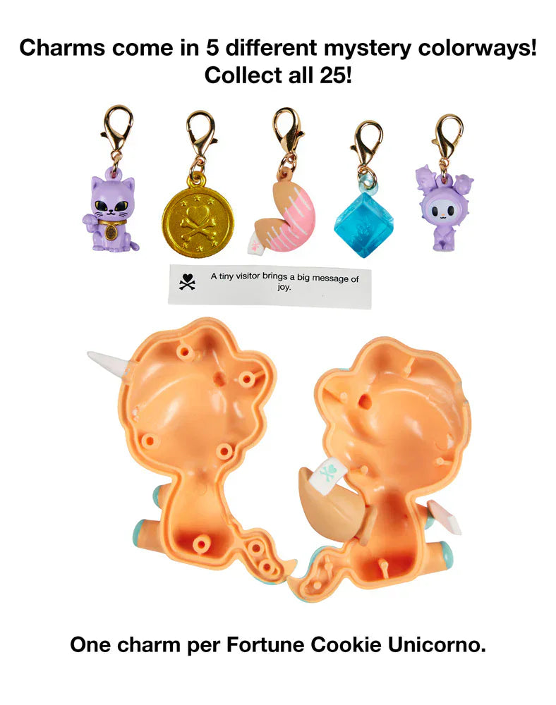 Five clip-on charms and a fortune slip are shown above an opened orange Tokidoki Fortune Cookie Unicorno Blind Box. Text notes each box includes one surprise figure for added fun and collectability.