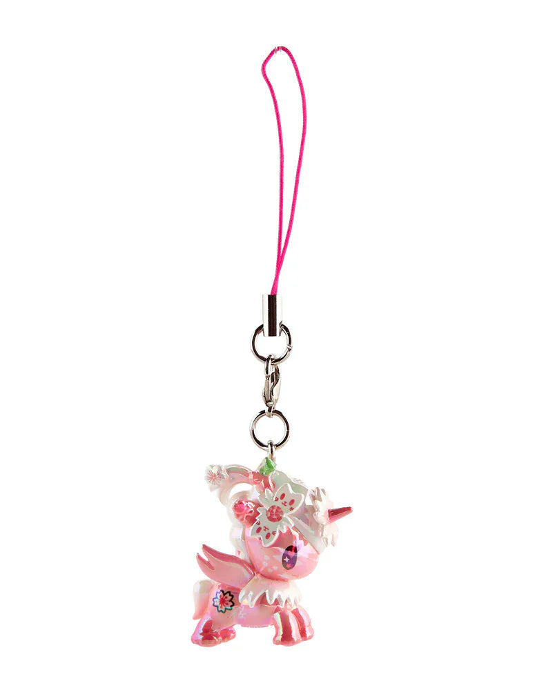 The tokidoki Shimmer Cherry Blossom Unicorno Frenzies Blind Box features a cherry blossom design with metal clasp and pink string loop—perfect for clip-on cute style and blind box collectors!.