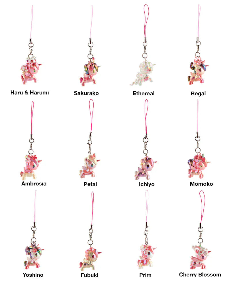 Twelve tokidoki Shimmer Cherry Blossom Unicorno Frenzies Blind Box keychains, each with unique designs and pink straps, are displayed in a 3x4 grid.