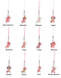 Twelve tokidoki Shimmer Cherry Blossom Unicorno Frenzies Blind Box keychains, each with unique designs and pink straps, are displayed in a 3x4 grid.