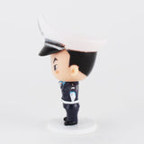 A figurine of a Chinese police officer wearing a hat, Best Happy Police Friends - Traffic Cop Huang, made by ExWorks/SII in China.