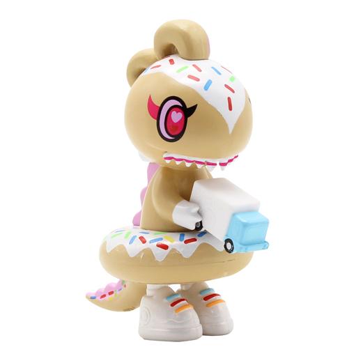 A toy of a dinosaur with sprinkles on it from the Tokimondo blind box series by tokidoki.