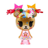 A Kawaii All Stars Blind Box toy bear by tokidoki wearing a hat with stars on it.