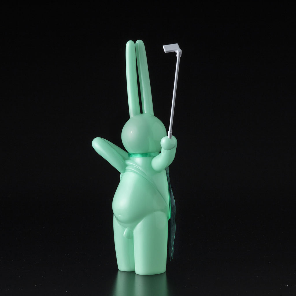 A Japanese vinyl bunny, The Daily Flasher by mr. clement, is depicted holding a golf club. Created by Tomenosuke Shoten (JP).