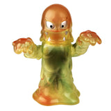 A translucent yellow and green Rumble Monsters Damnedron TK2 Exclusive toy figure of a monster.